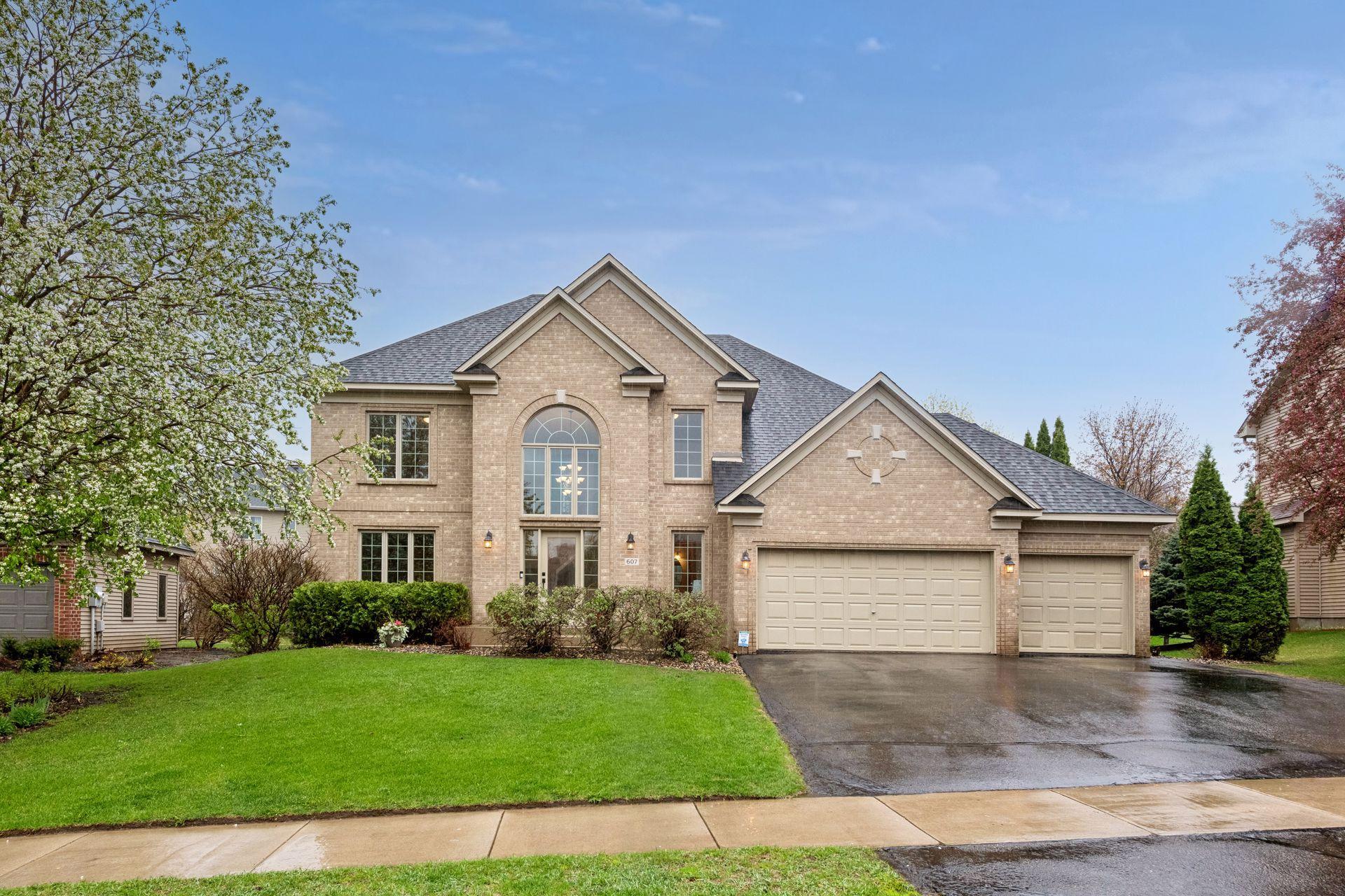This Hans Hagen stately brick front elevation has timeless curb appeal.
