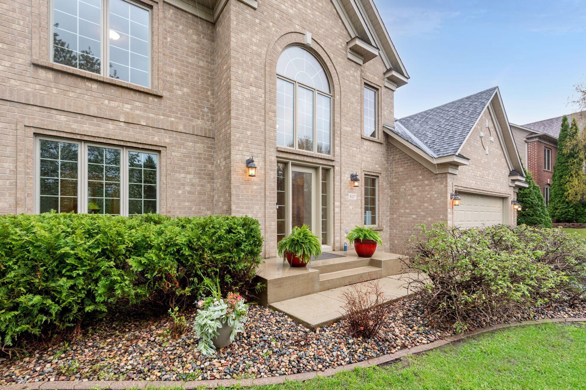The beautifully maintained exterior has classic architectural details.