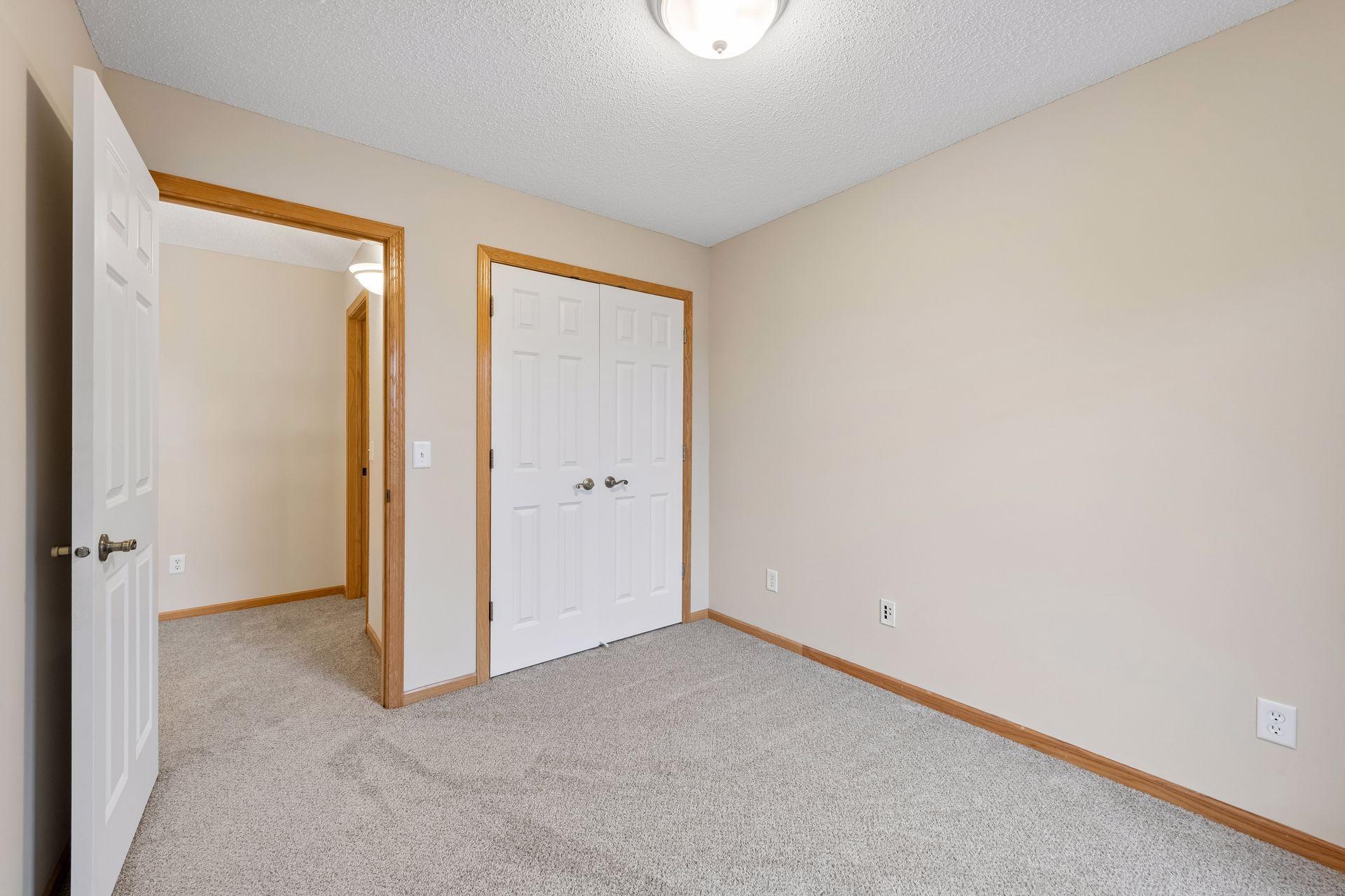 Bedroom #2 with double closet doors