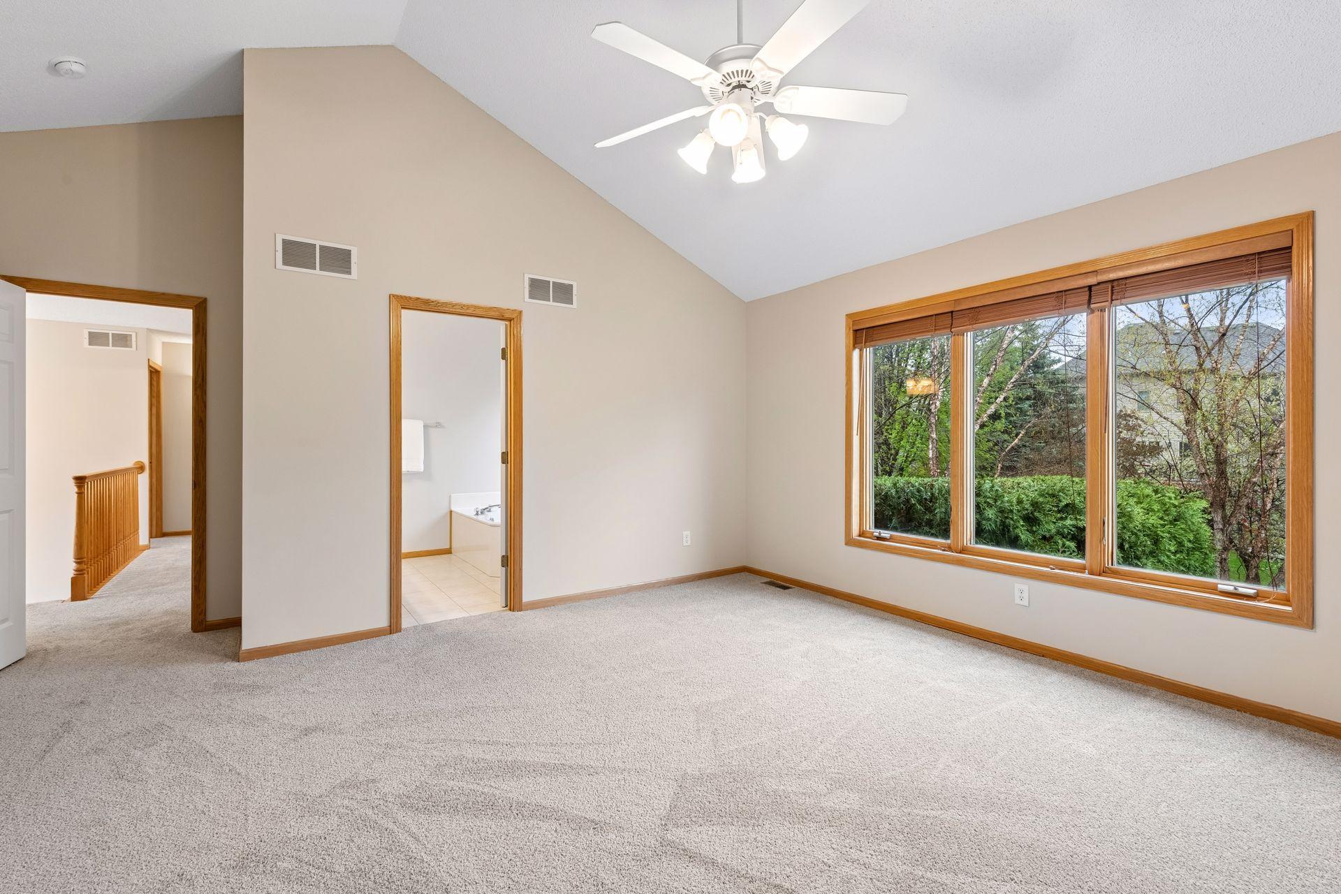 Primary suite with walk-in closet and en-suite bath access