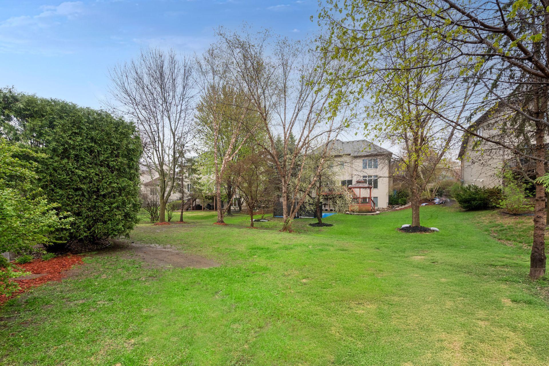 The backyard has a large amount of greenspace perfect for backyard games, swing-set, hot tub or whatever your dream is. Plenty of mature trees create privacy.