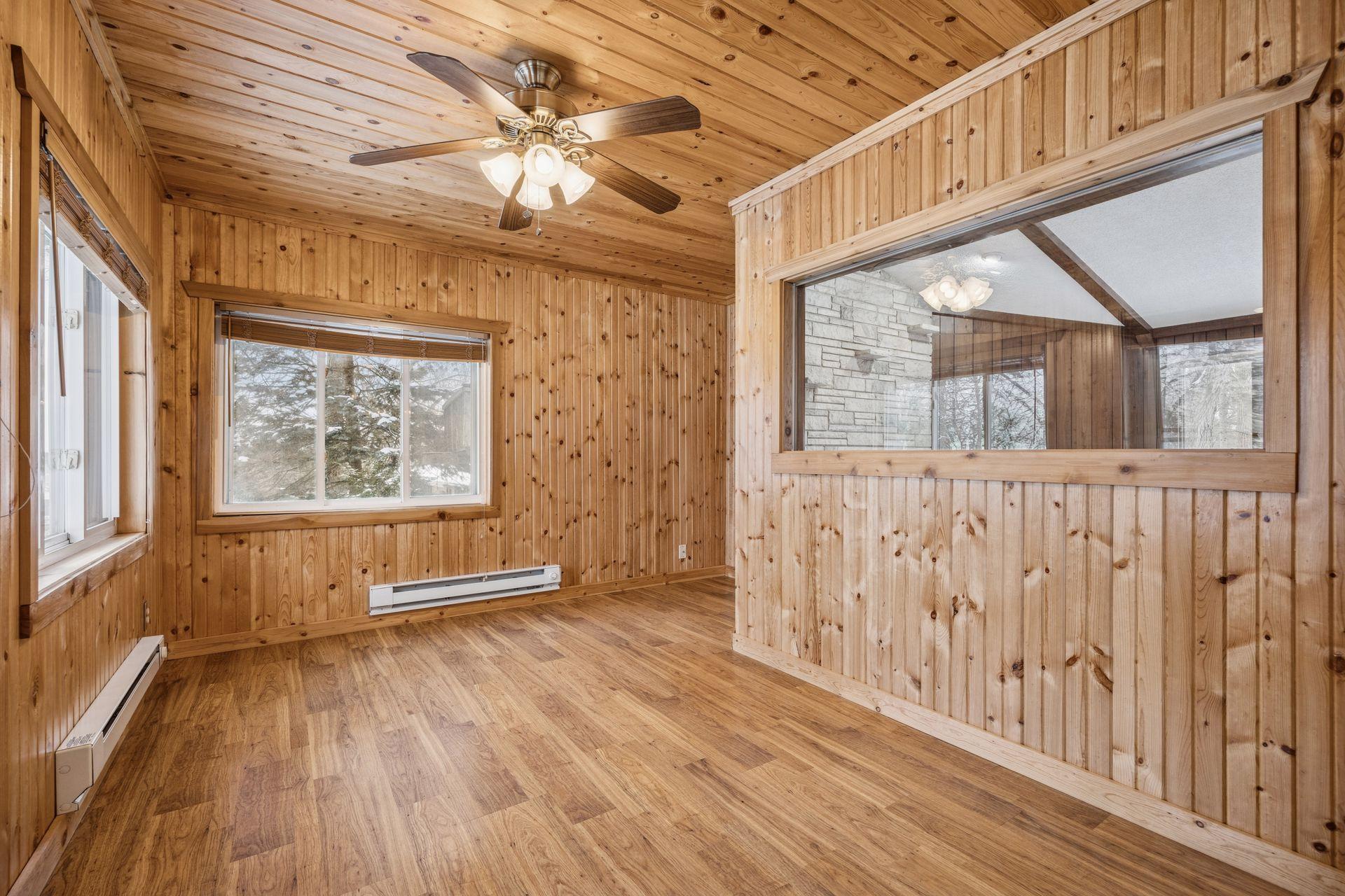 4 season porch w/ look thru window to living