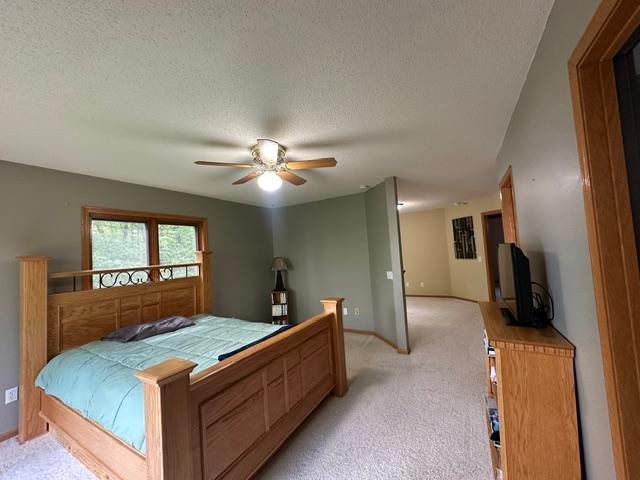 Primary bedroom looking into bonus space