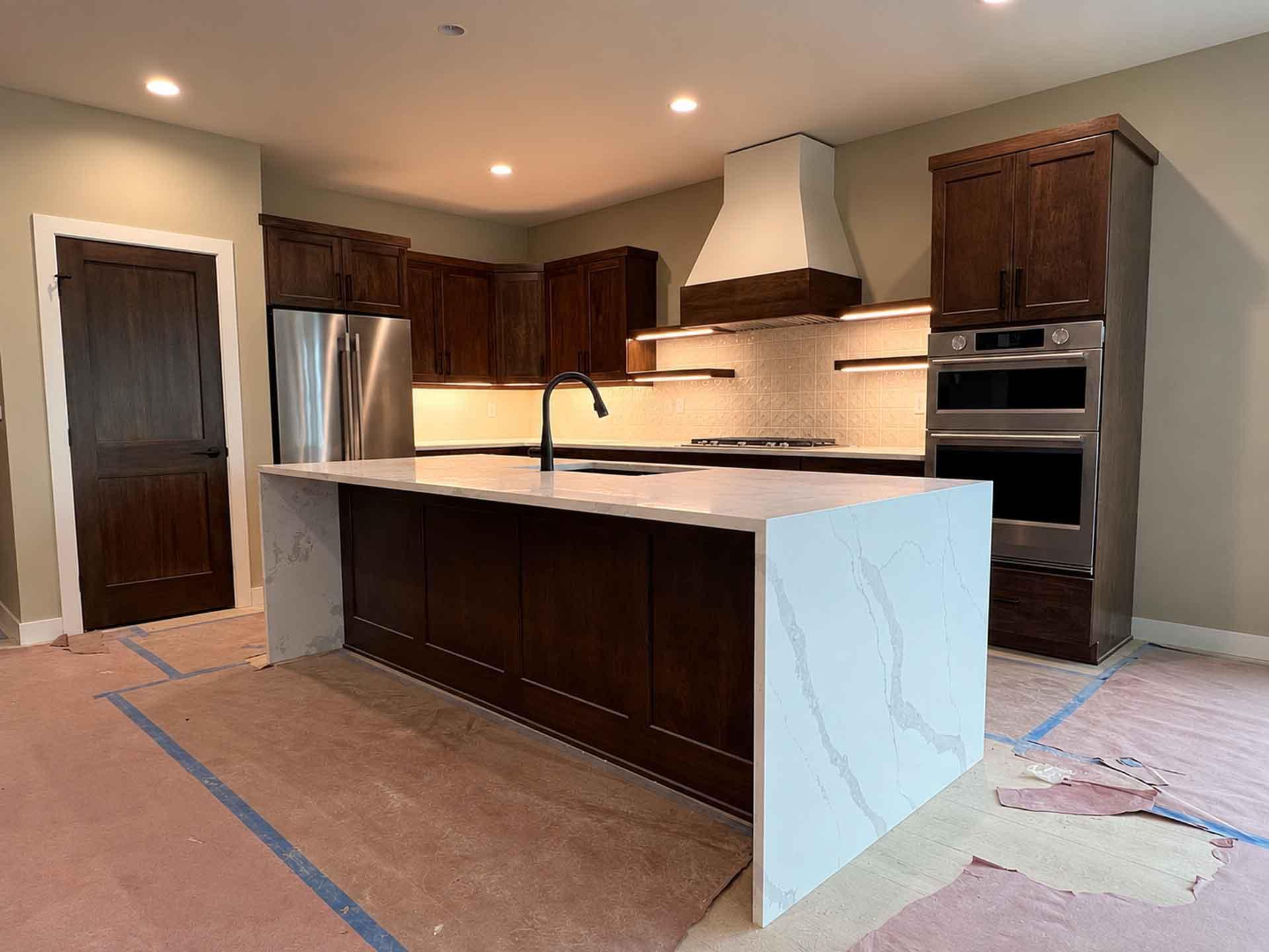 Gourmet Kitchen-waterfall island