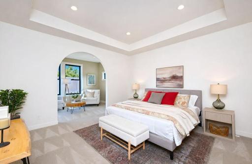 6448-Primary bedroom overlooking sitting roomch-sunset-torino-main-level-primary-suite.jpg