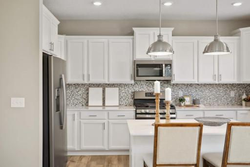 Beautiful backsplash and quartz countertop