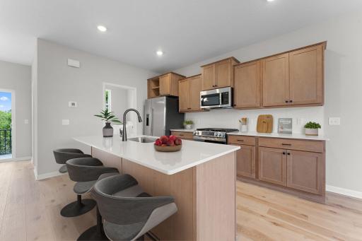 Kitchen *Photo of a previously built home of the same floorplan. Finishes/options may vary.