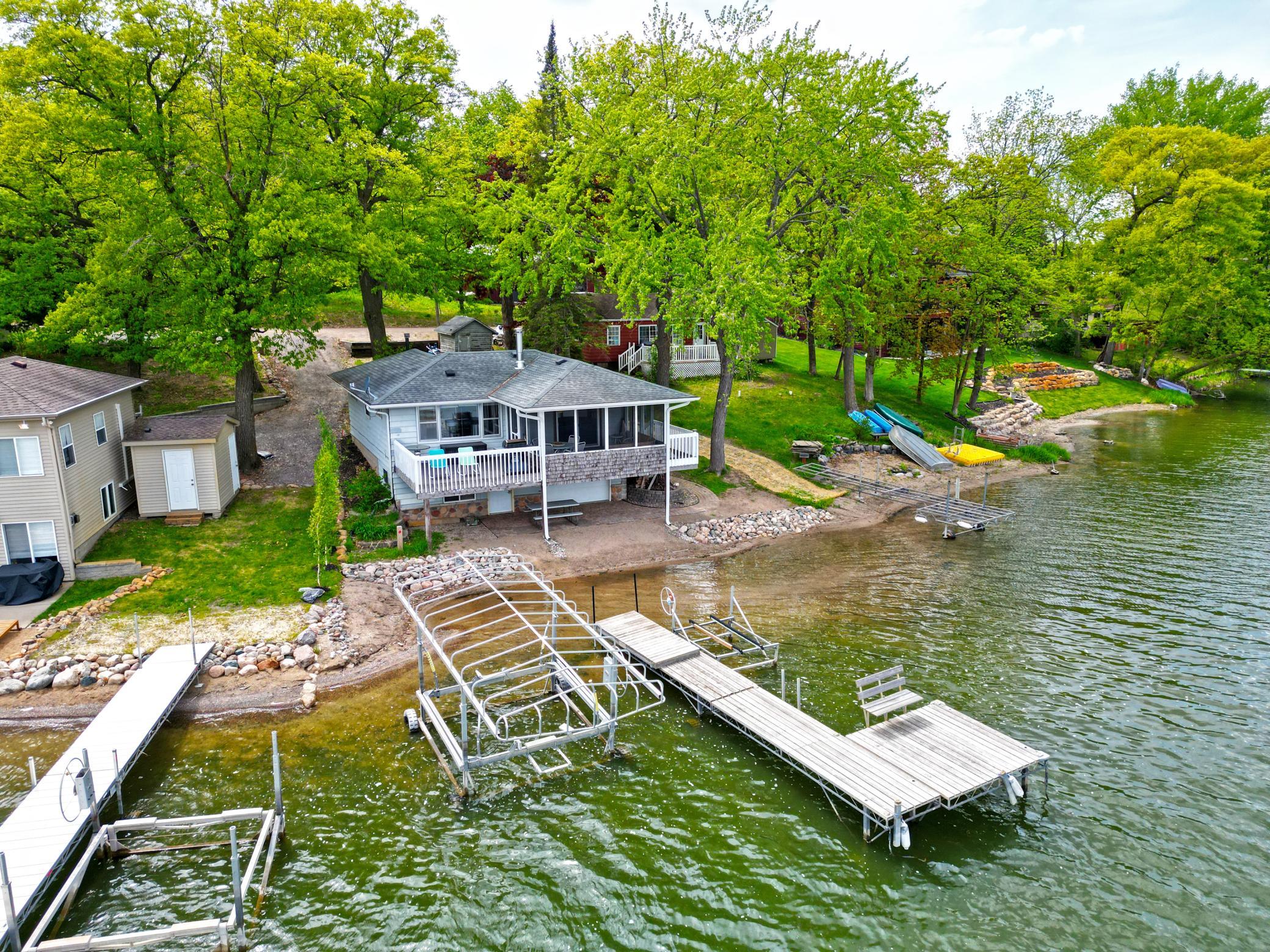 Enjoy lakeside living in this 3-bedroom home set on 52 feet of Indian Lake shoreline.
