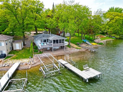 Enjoy lakeside living in this 3-bedroom home set on 52 feet of Indian Lake shoreline.