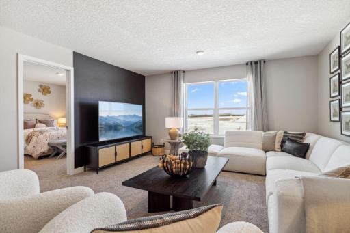 Upper-level loft, sure to become a favorite hangout spot! Model home, color and finish will vary.