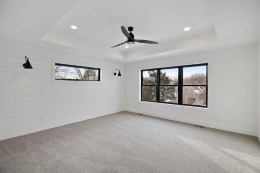 Large Owner's Suite offers spa-like bath and walk-in closet. Pictures of previously built house.