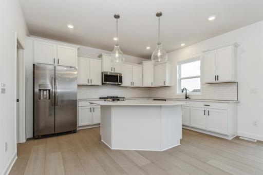 (Photo of a decorated model, actual homes finishes and colors will vary) Welcome to the stunning Sinclair!