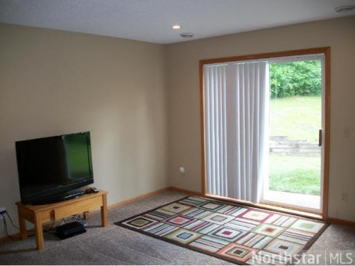 Third level family room that walks out to the backyard.
