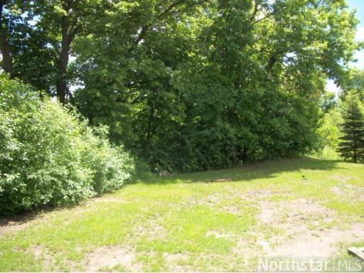 The yard is surrounded by a full treeline and overlooks 2 ponds.