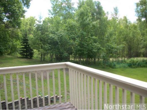 Large deck looks out to a very private and peaceful yard.