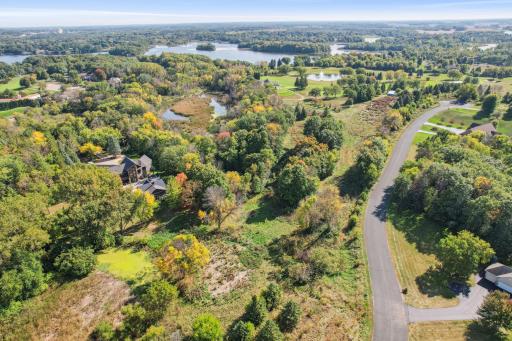 Gorgeous summertime views of the neighborhood highlighting Lake O'Dowd in the distance.