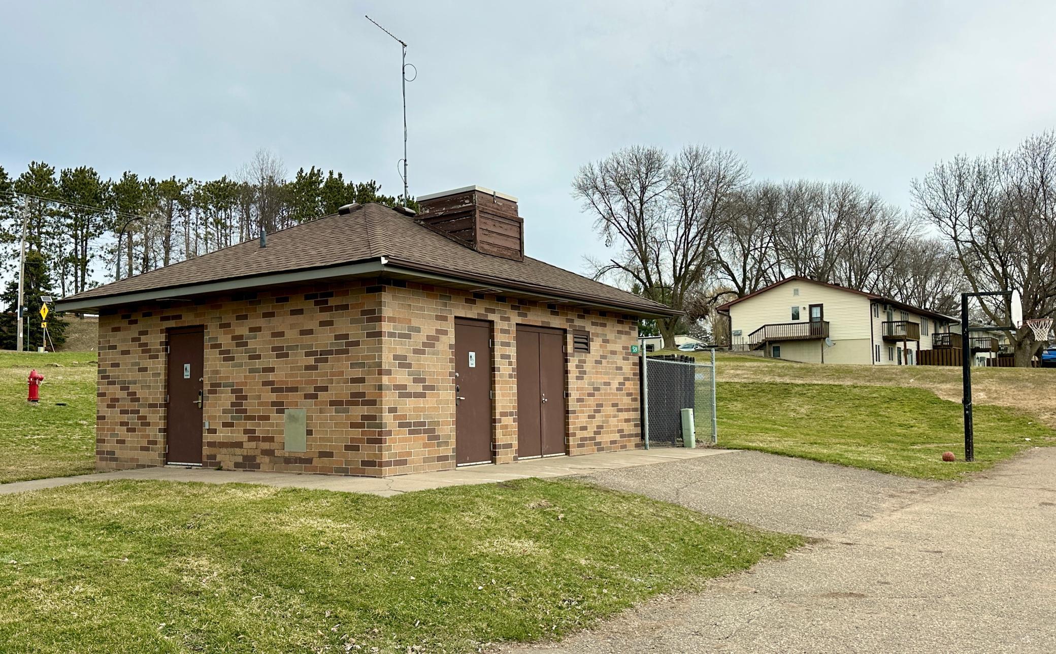 Bathrooms at the park as well as the basketball hoop for a quick pick up game.