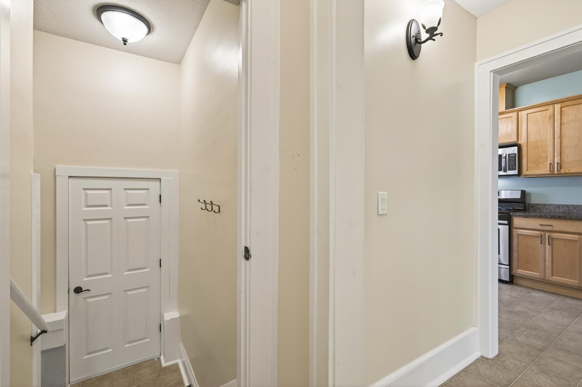 Hallway to backdoor/downstairs