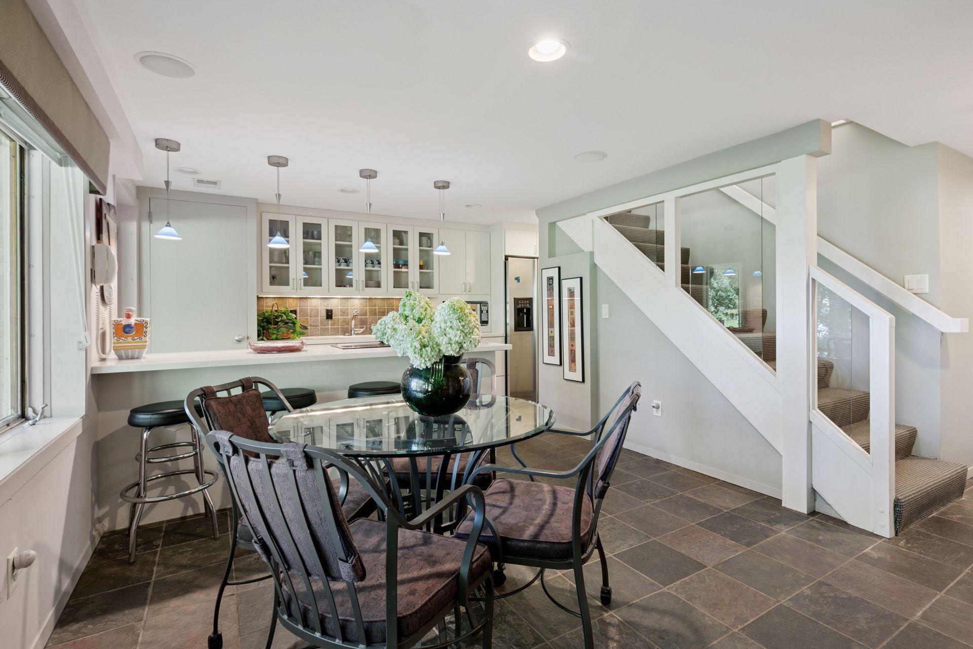 Stairs to lower level-an entire separate living area.