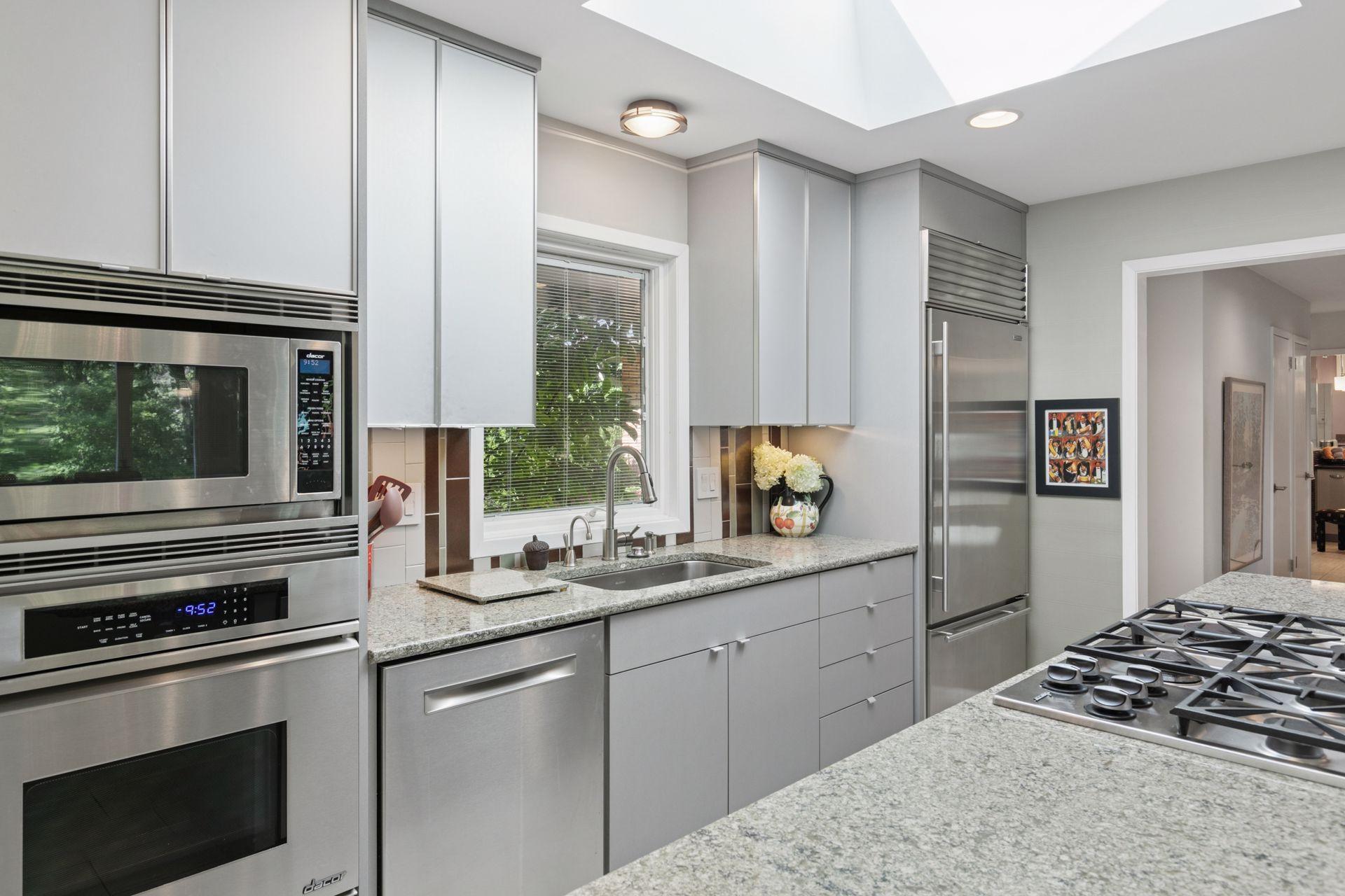 Lots of sun from south facing window. Sub-Zero frig and Dacor cooktop, oven, microwave and warming drawer.