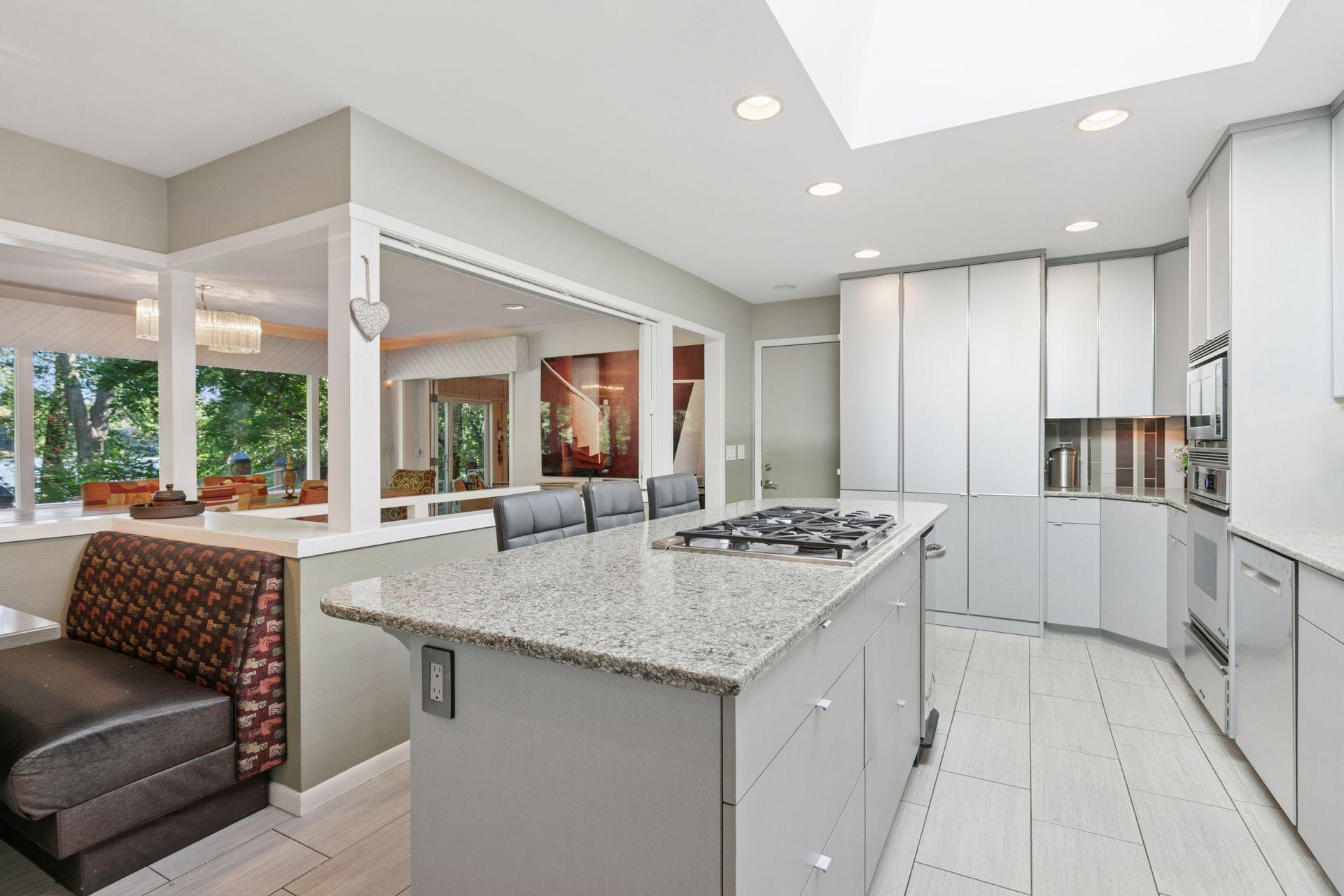 Enjoy lake views while working at the large center island.