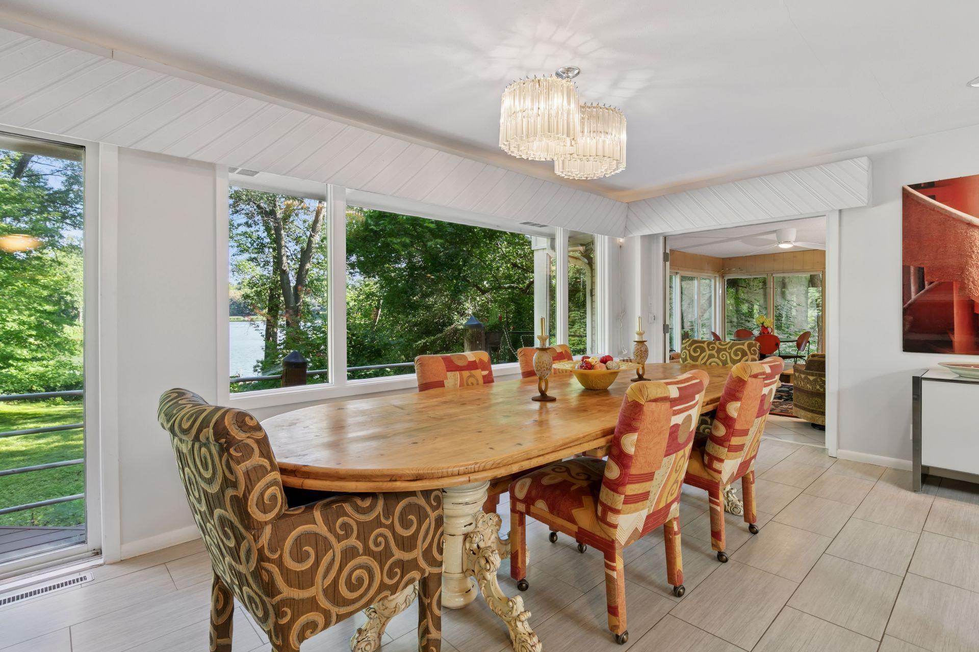 Adjacent to the dining area is the four season porch.