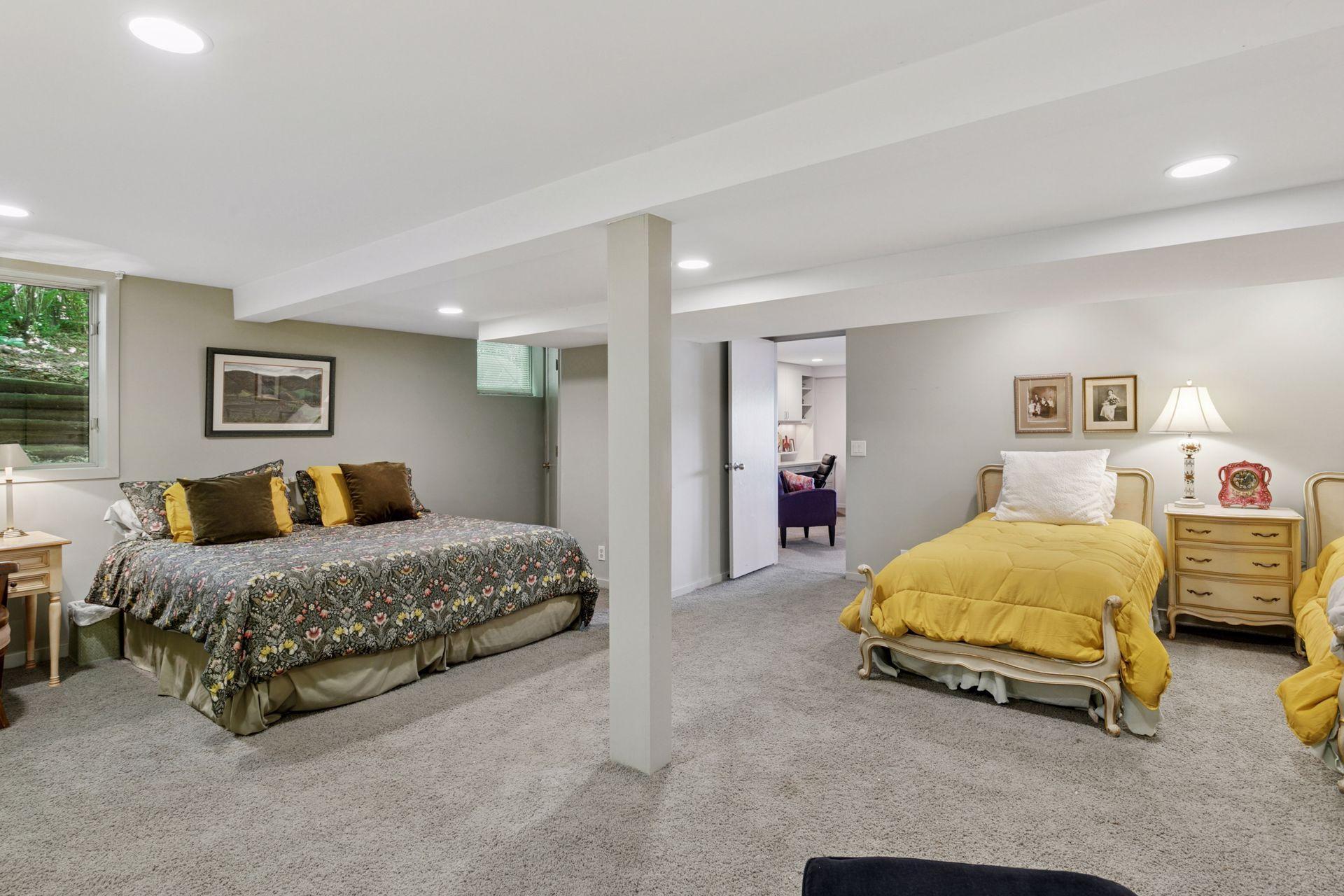 Spacious 22' x 20' lower level bedroom has generous closet space and room for several beds. New carpeting throughout this room!