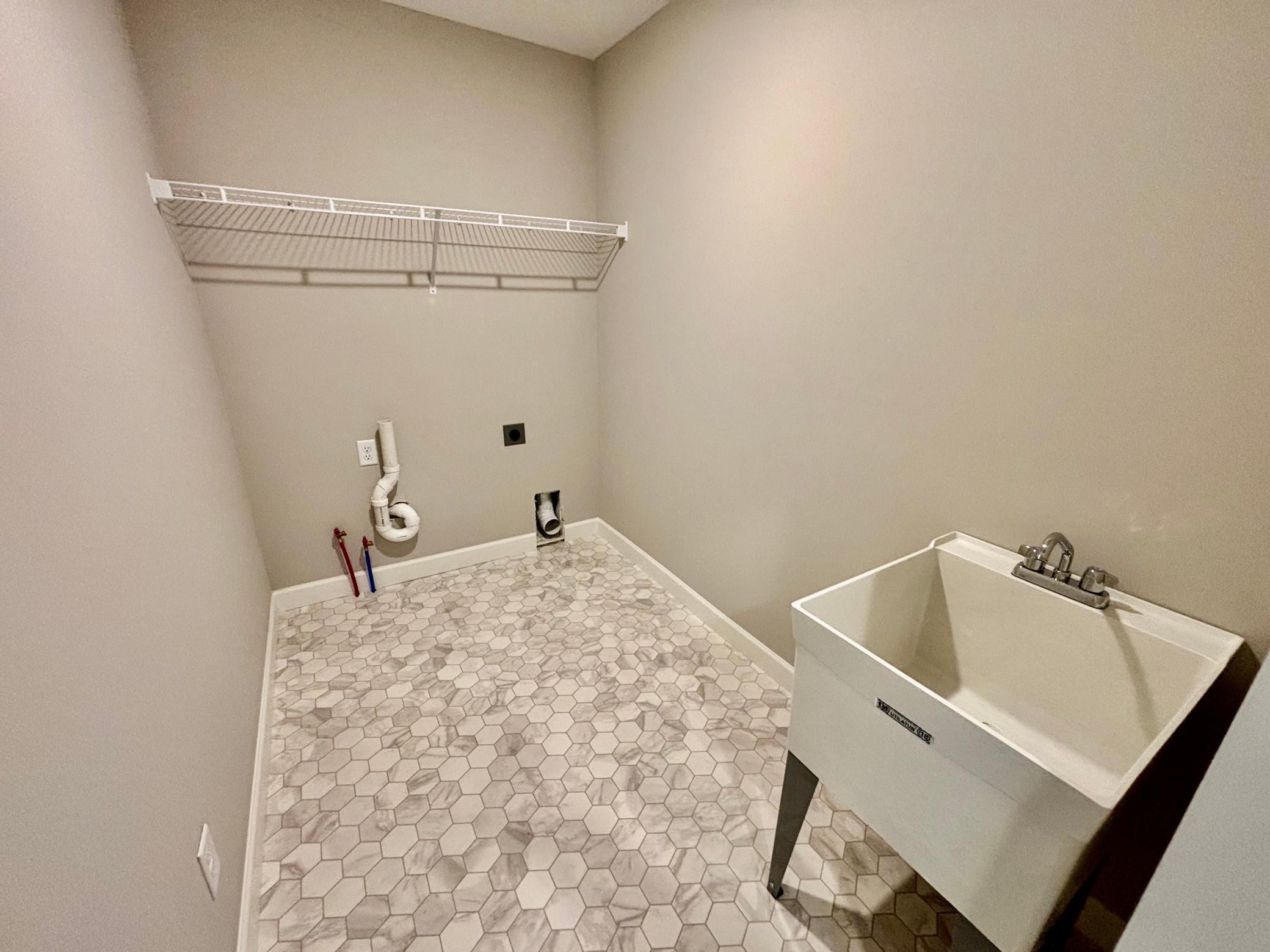 Upper Level Laundry Room - The Weston at 11359 5th St NE in River's Edge!