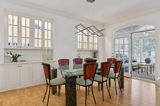 Dining space with beautiful in lit cabinets