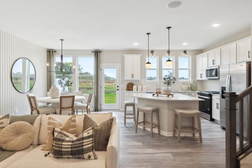 Photo for 9236 Larimar Trail, Eden Prairie, MN 55347 - listing #6826280 Convenient dining room location right off the kitchen, perfect for any sized table! Photo of model home.