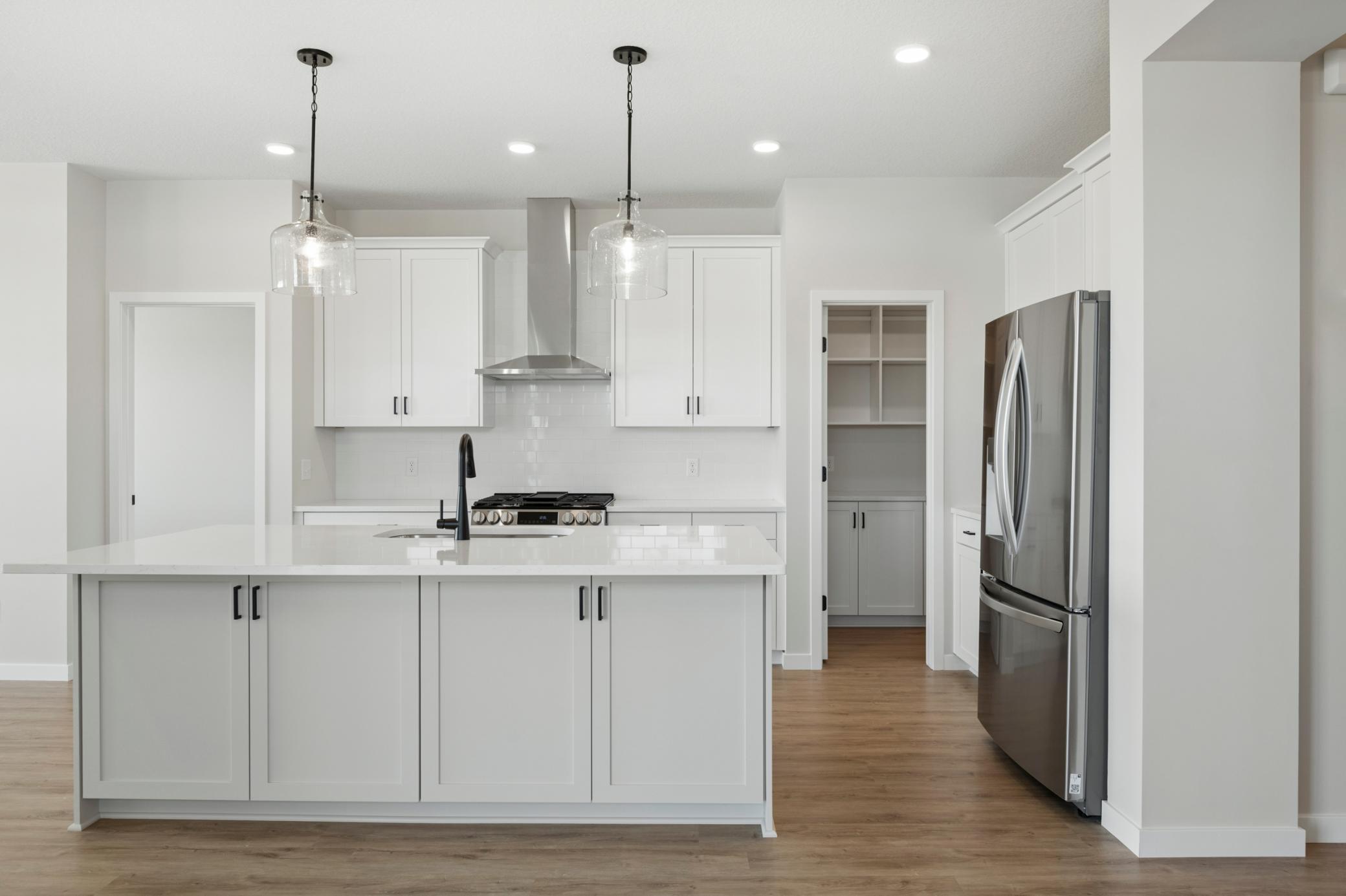 COMPLETED AND READY TO GO! Welcome to the Aurora plan by Robert Thomas Homes.