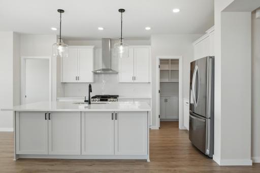 COMPLETED AND READY TO GO! Welcome to the Aurora plan by Robert Thomas Homes.