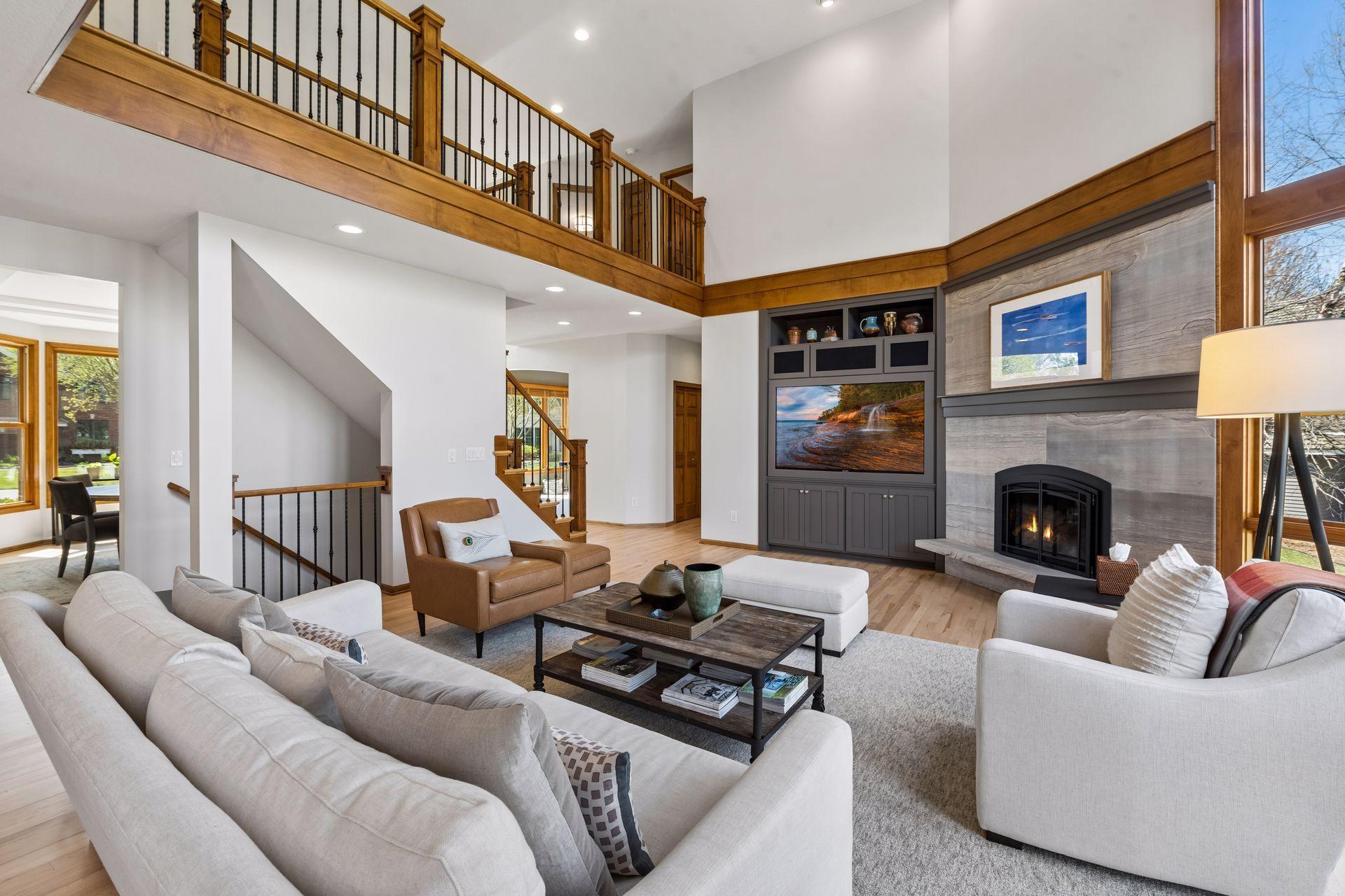 Great room with Brentwood slab stone fireplace and hearth with mantel.