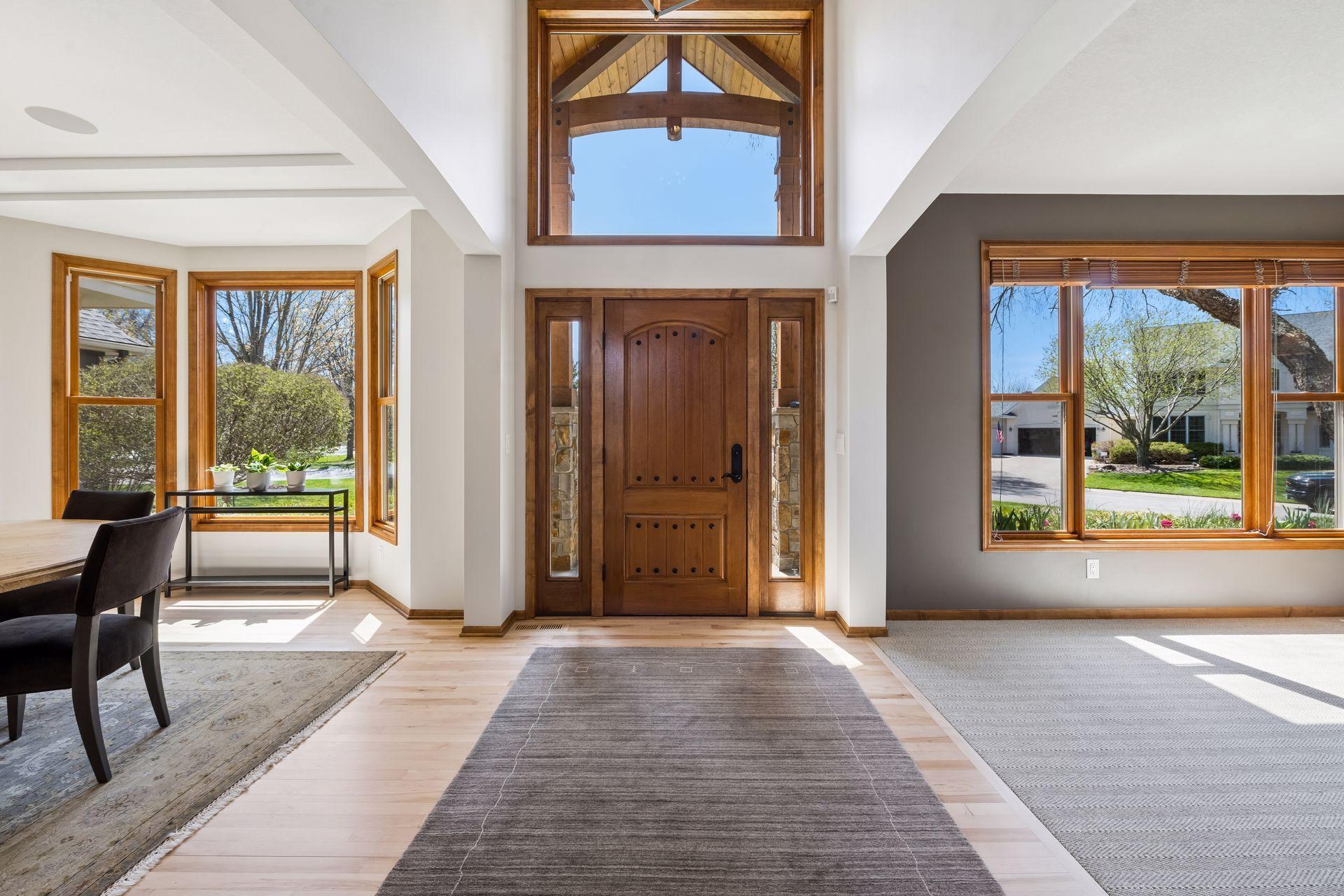 Sun-drenched, natural light fills foyer, dining room and bonus/flex room.