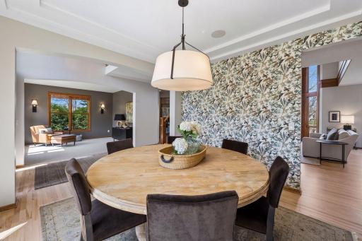 Dining room leads to great room, opens to flex/bonus room.
