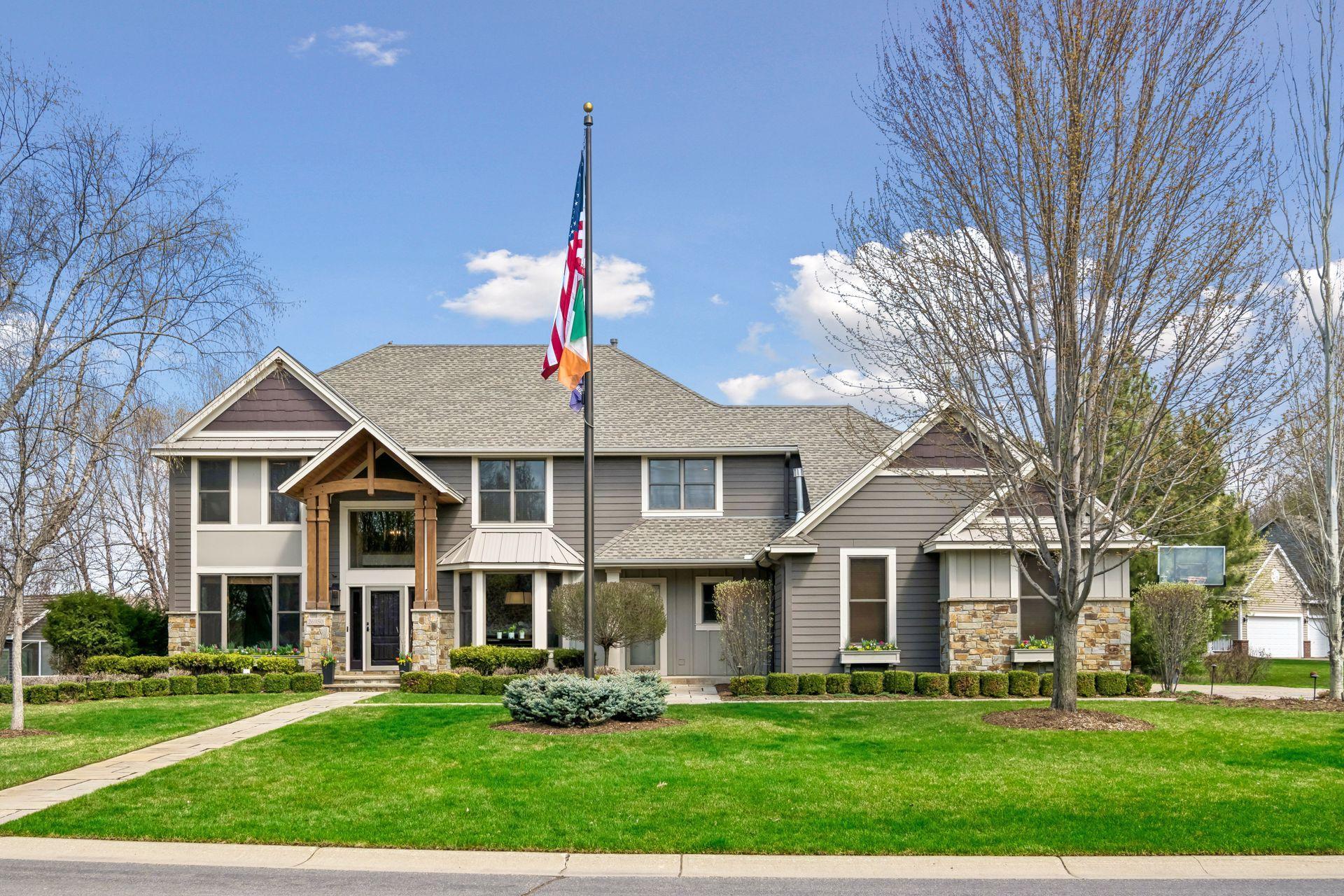 26950 Marsh Pointe Ct. Stone and LP Smartside on front with expanded garage with flower boxes, 11 zone irrigation and professionally planned landscape and beautiful stone walkways.