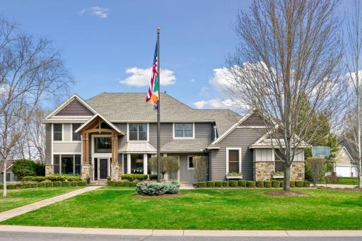 26950 Marsh Pointe Ct. Stone and LP Smartside on front with expanded garage with flower boxes, 11 zone irrigation and professionally planned landscape and beautiful stone walkways.