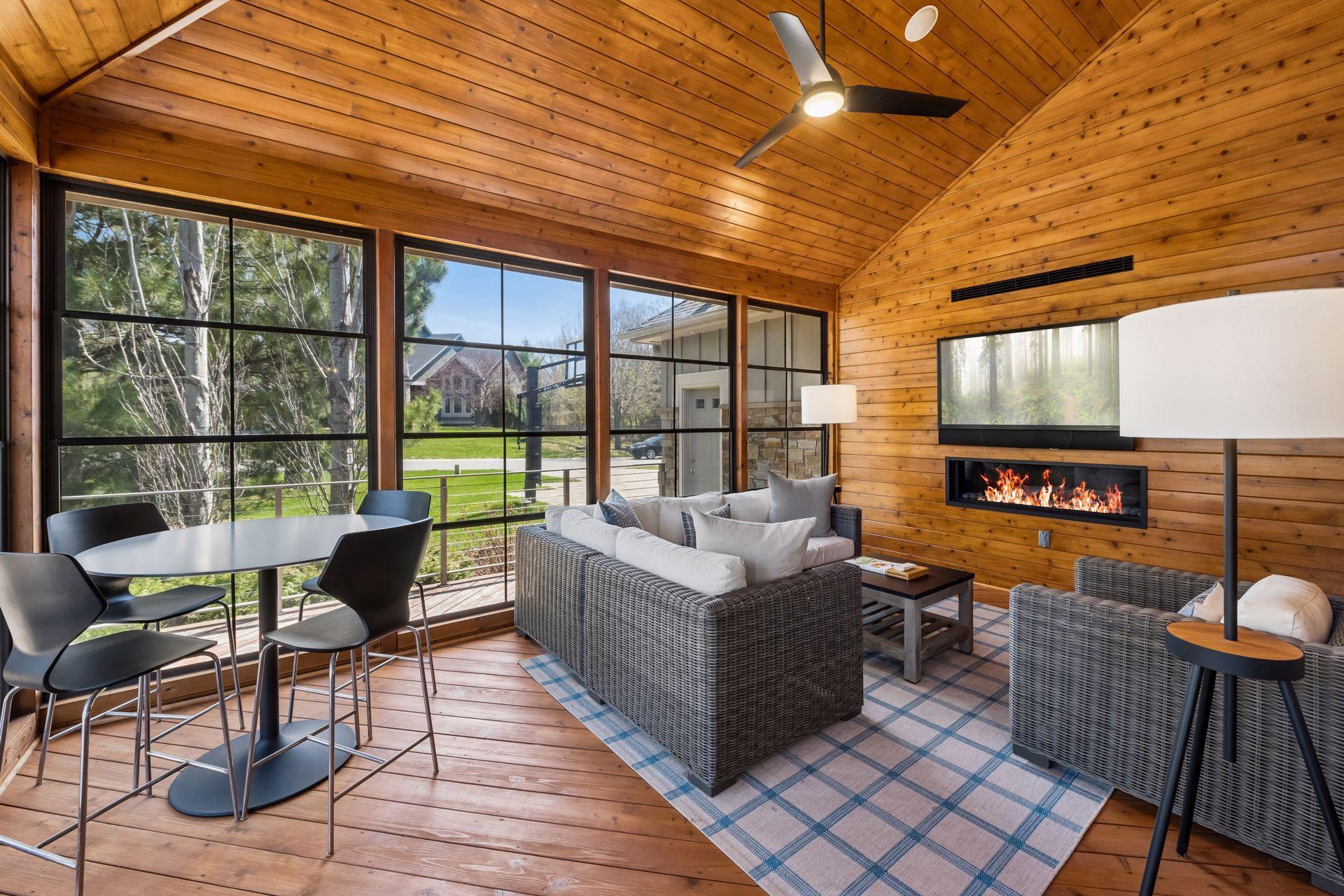 Fabulous porch with 3 season windows, media and speakers plus cozy fireplace to take in the games in all seasons!