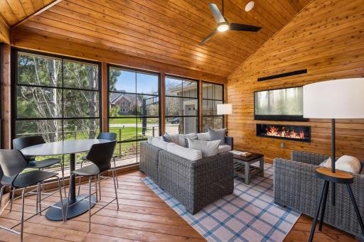 Fabulous porch with 3 season windows, media and speakers plus cozy fireplace to take in the games in all seasons!