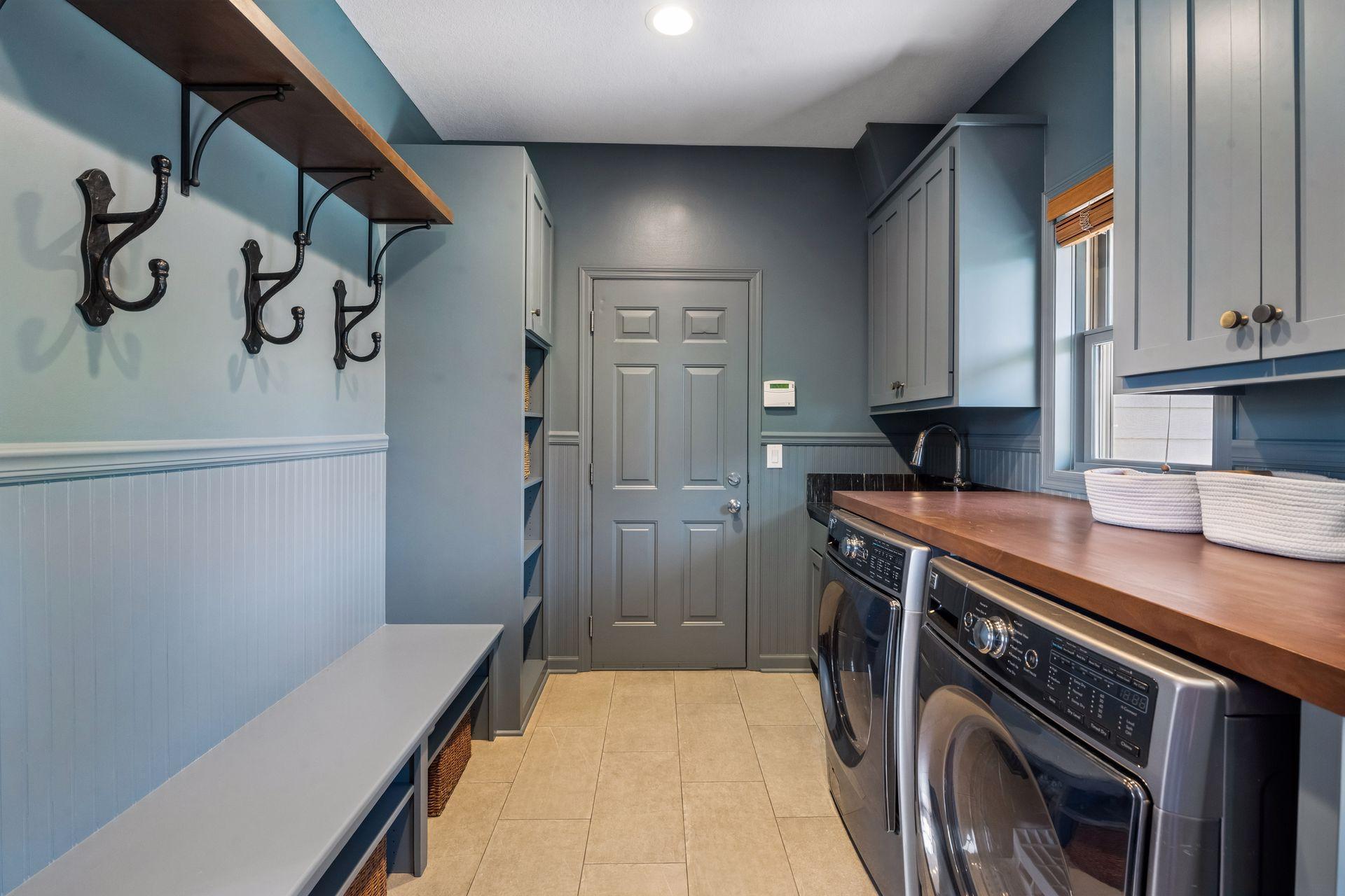 Redesigned drop-zone/mudroom/laundry.