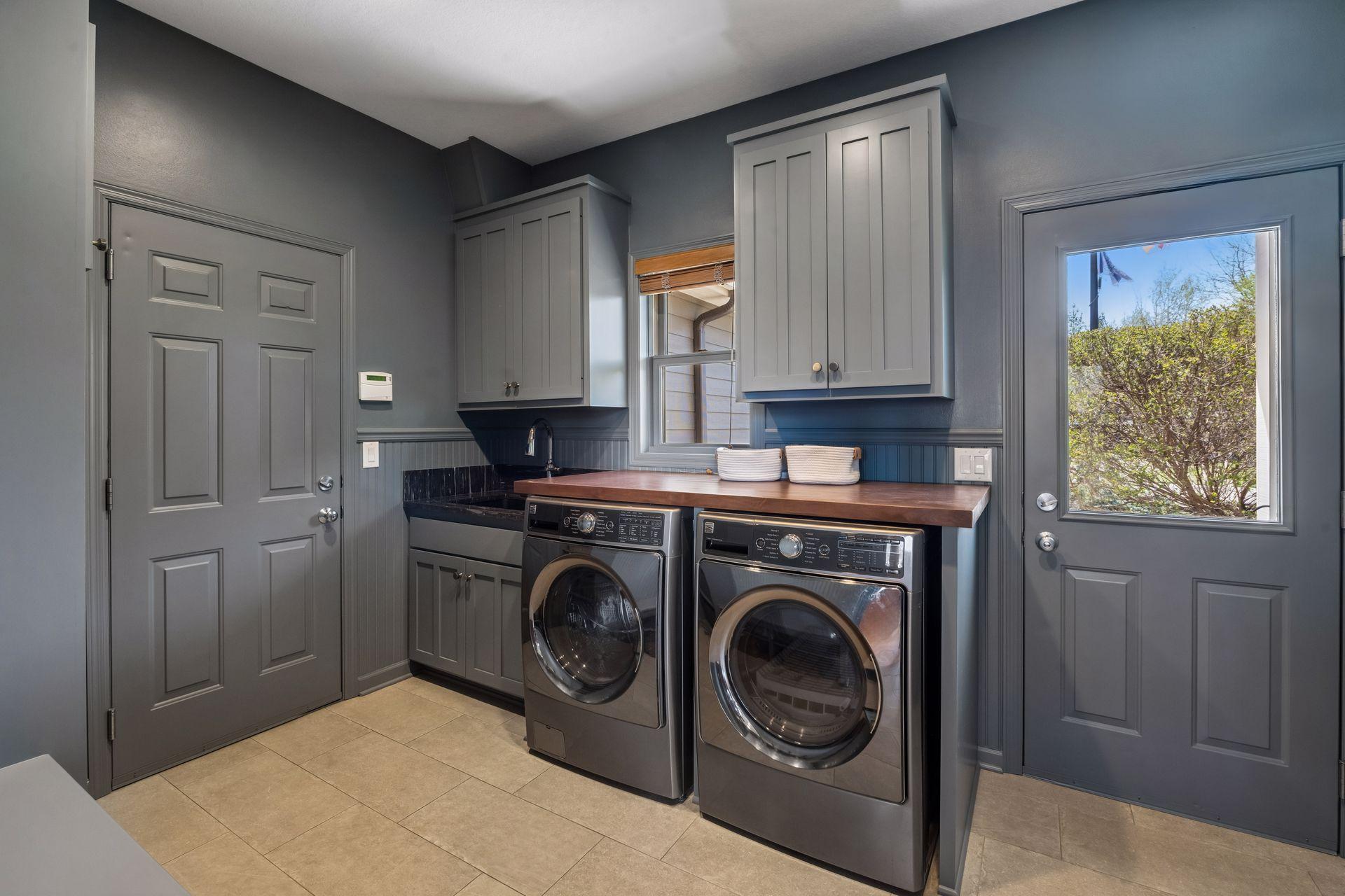 Reimagined drop-zone/mudroom/laundry with new sink, fixture, and granite top. Keeping it tidy!