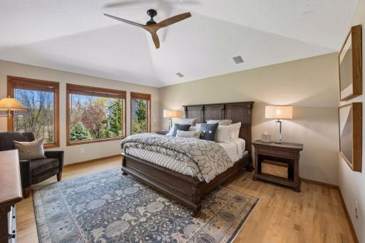 Primary suite bedroom. Abundant natural light. Space enough for furnishings plus a sweet reading area.