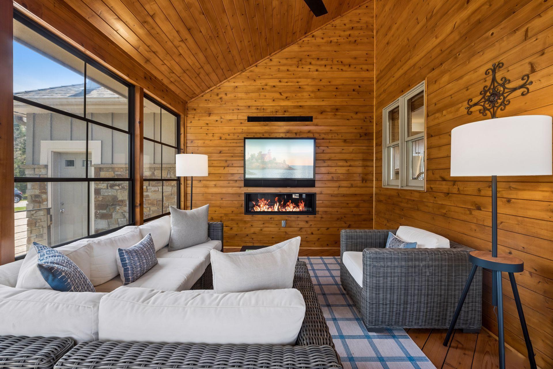 3 season porch with natural gas fireplace and big screen (included).