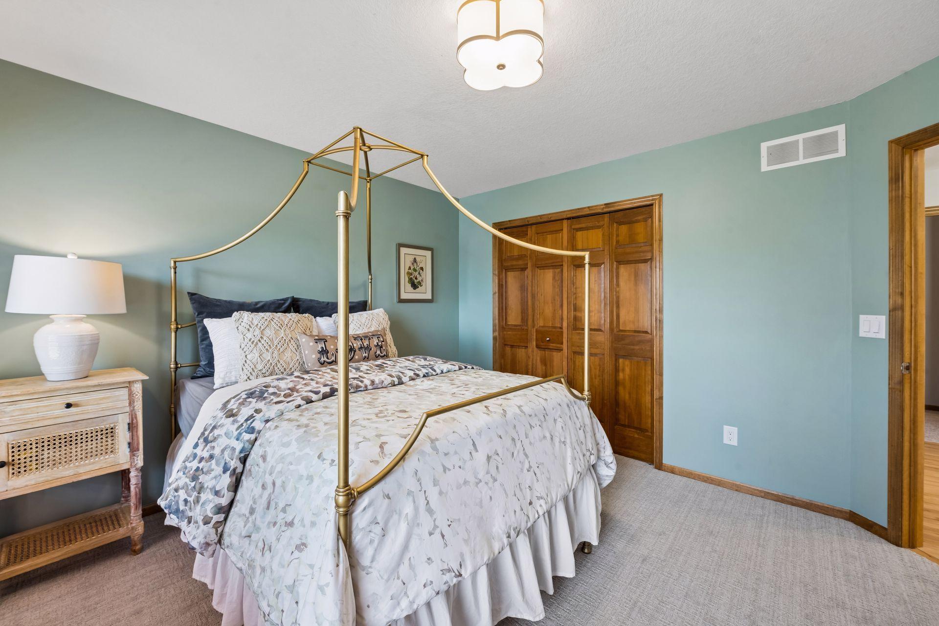 Upper level bedroom with new carpet and lighting - freshly painted, too.