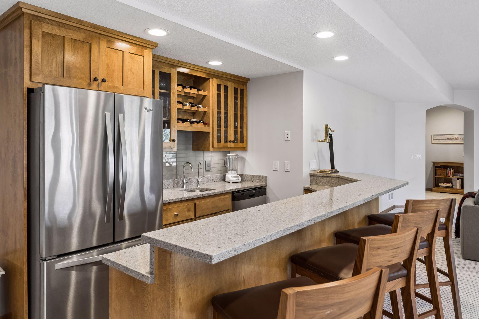 Lower level family room wet bar for limitless entertaining options.