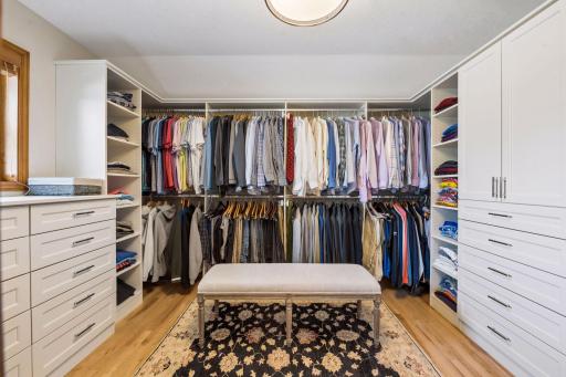 Custom-fitted closet with ample hanging space, shelves, drawers and cabinets. And natural light to ensure your socks match.