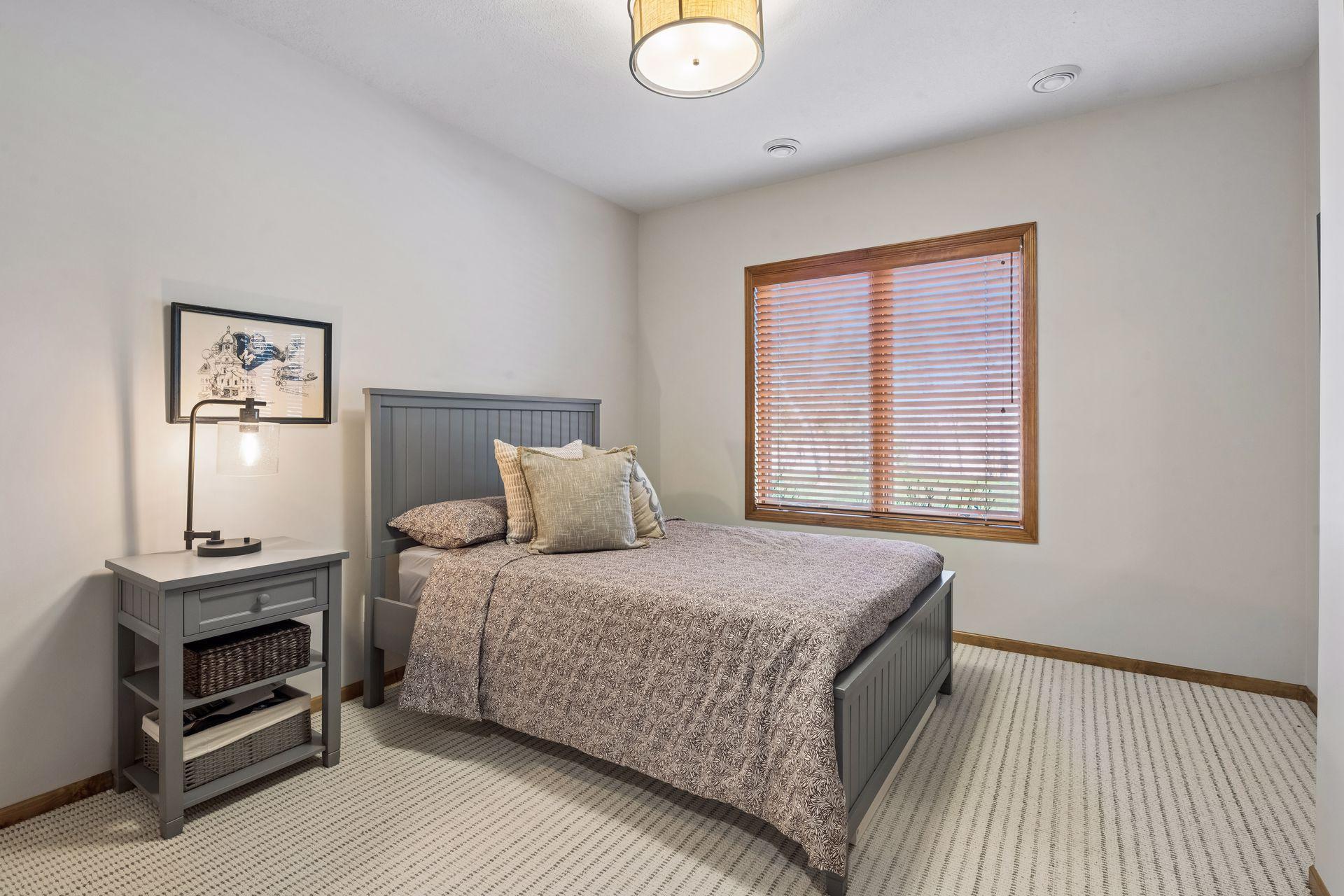 Lower level bedroom - convenient for guests or independent teen. Walk-in closet.