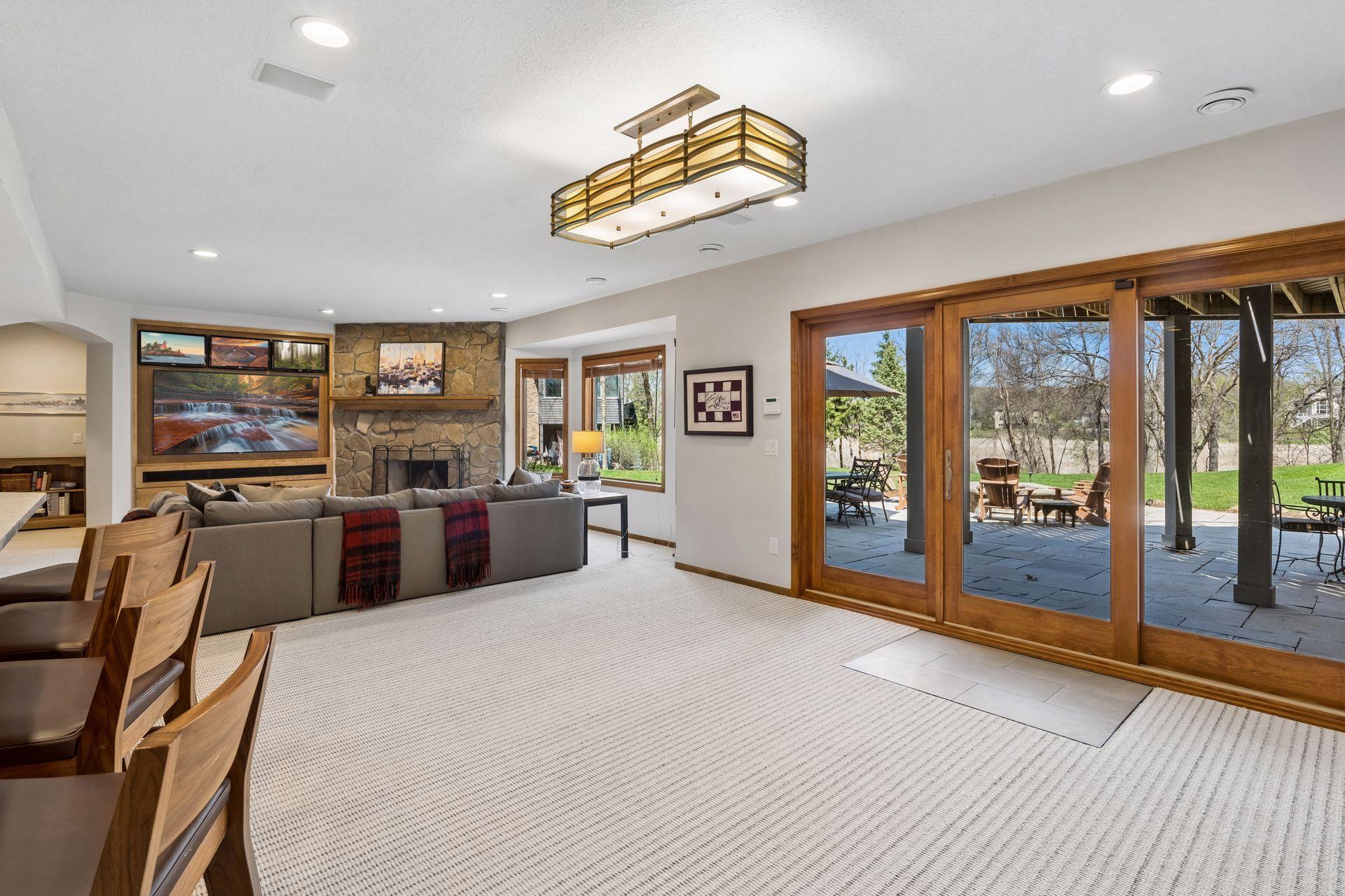 Walk-out lower level to expansive patio, under-deck storage and firepit. Ready, set, entertain!