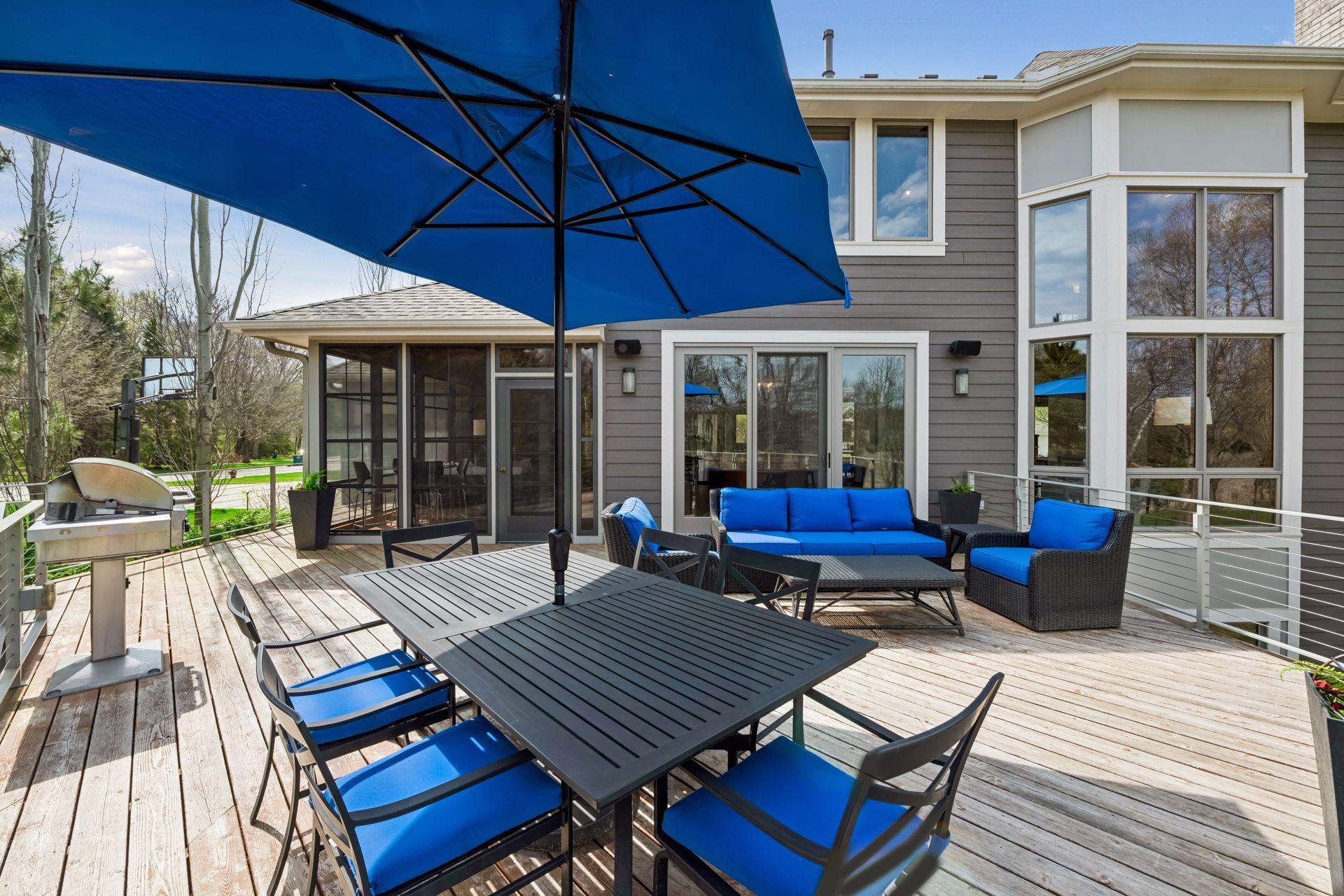 Deck - just off informal dining room. Deck rail lighting and custom stairs. Enjoy the view with minimal obstruction from the metal and wire rails.