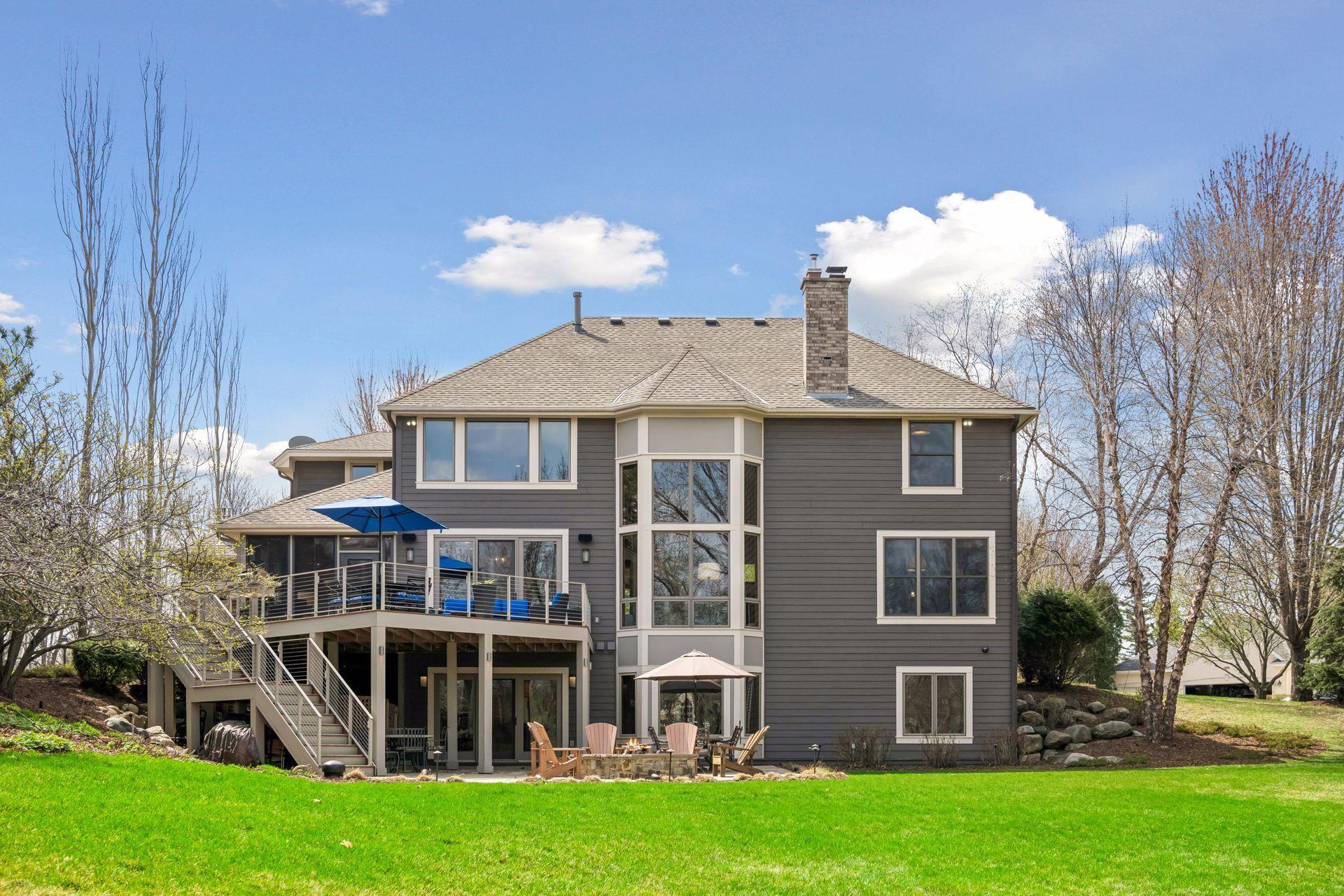 Windows (replaced in 2017) with full trim, accented bay and all sides LP Smartside. Roof new in 2021.